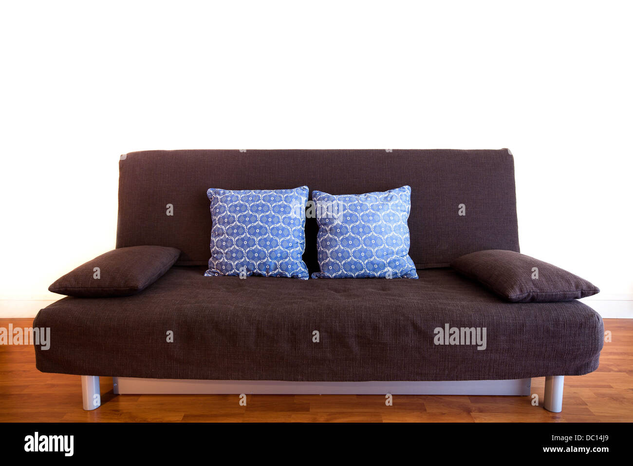 black couch with pillows