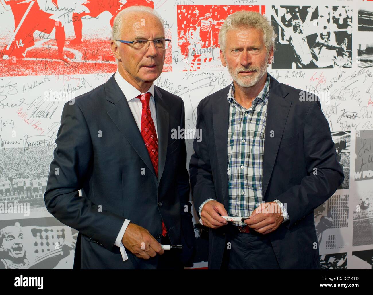 Berlin, Germany. 06th Aug, 2013. Franz Beckenbauer (L) and Paul Breitner pose prior to an event to celebrate the 50th anniversary of the German Bundesliga in Berlin, Germany, 06 August 2013. Photo: Tim Brakemeier/dpa/Alamy Live News Stock Photo