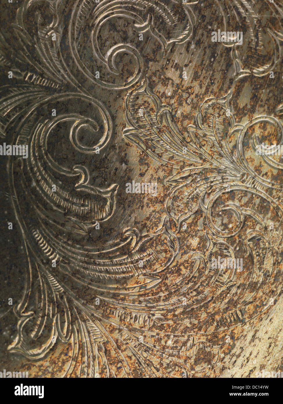 Oxidized grungy rusted metal texture background with ornament Stock Photo