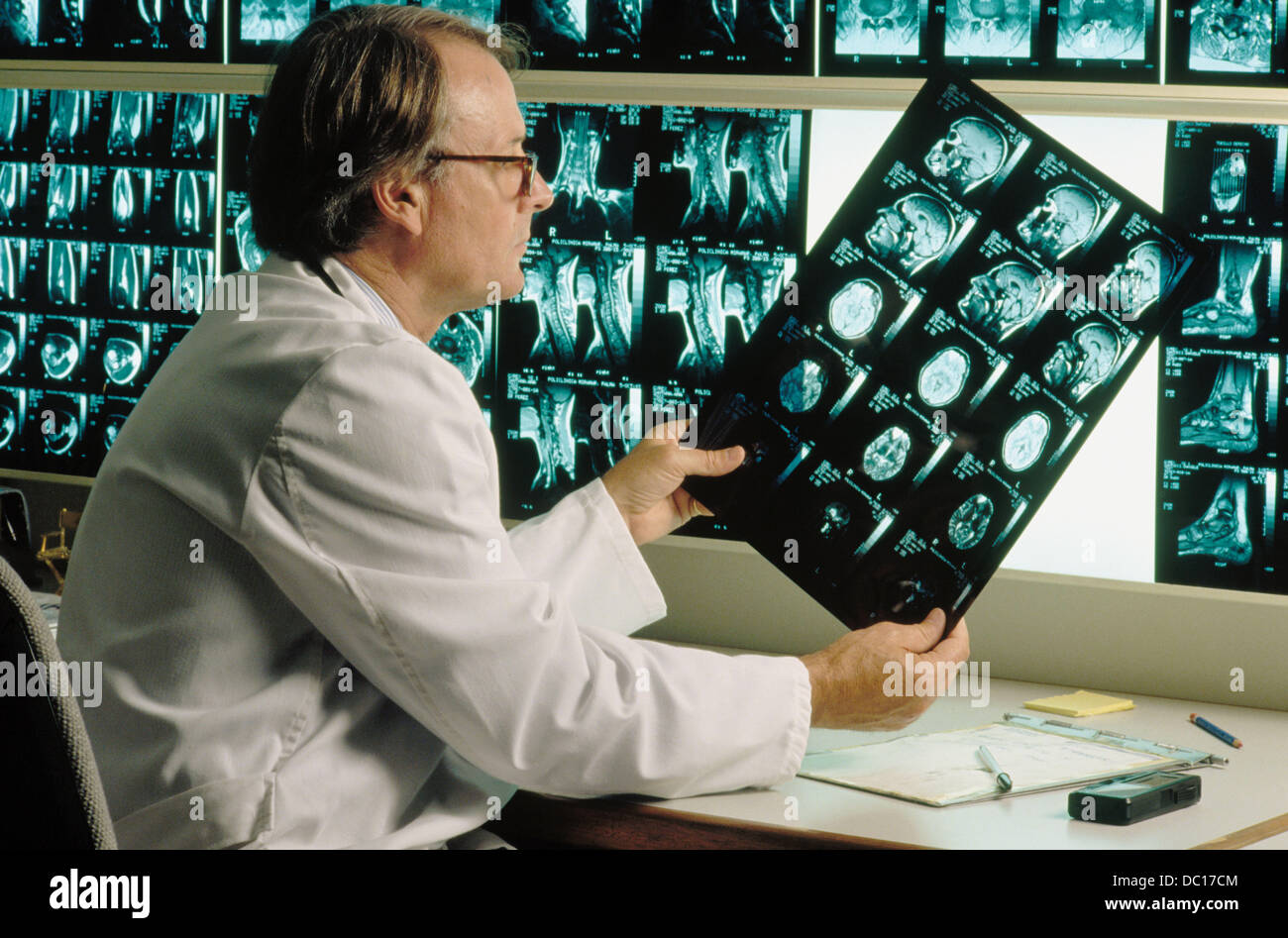 Doctor with resonance images Stock Photo Alamy