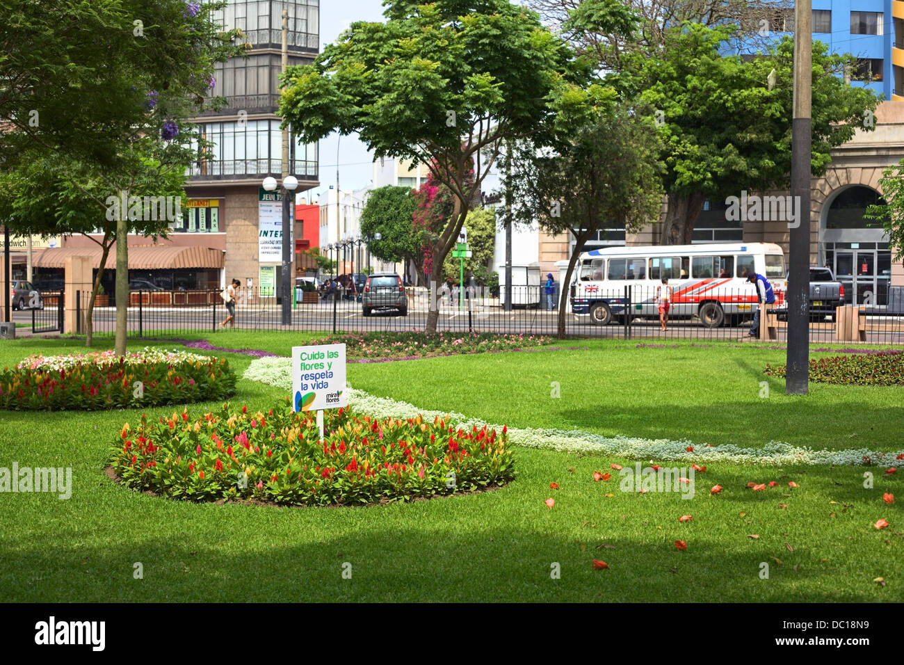 Flowers with a sign meaning "Take care of the flowers and respect life