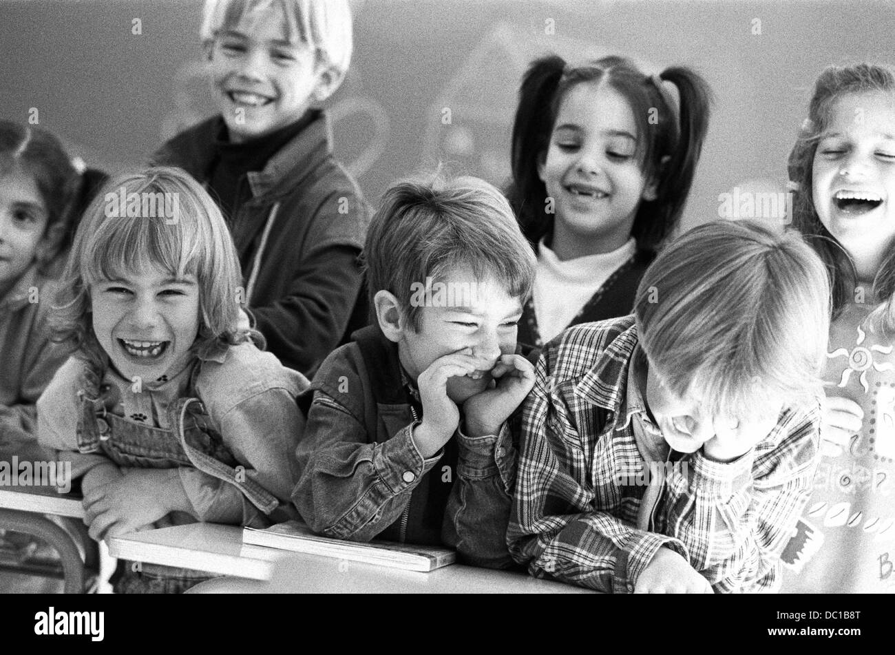 Girl laughing classroom Black and White Stock Photos & Images - Alamy