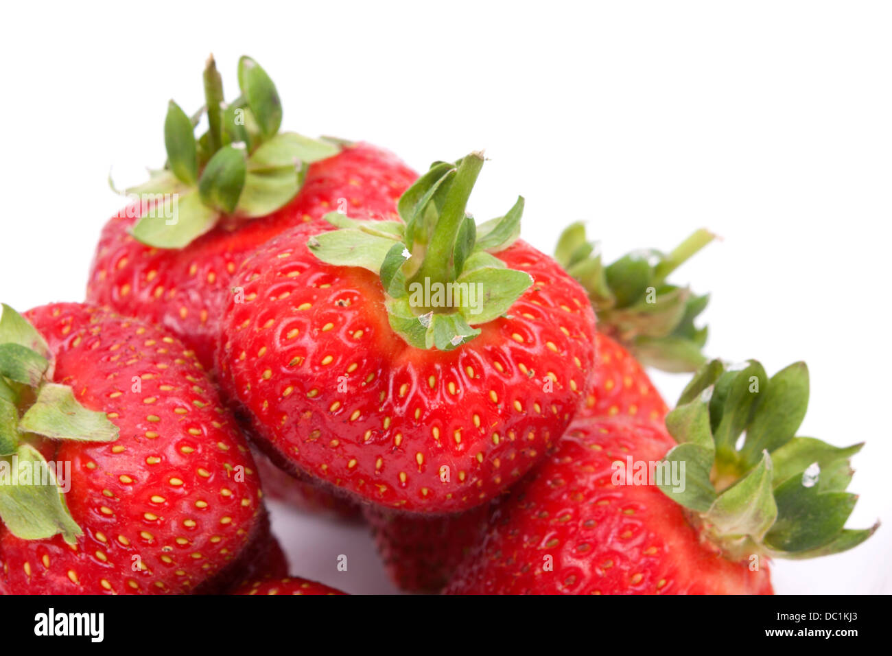 Strawberry fruits isolated on white background Stock Photo - Alamy