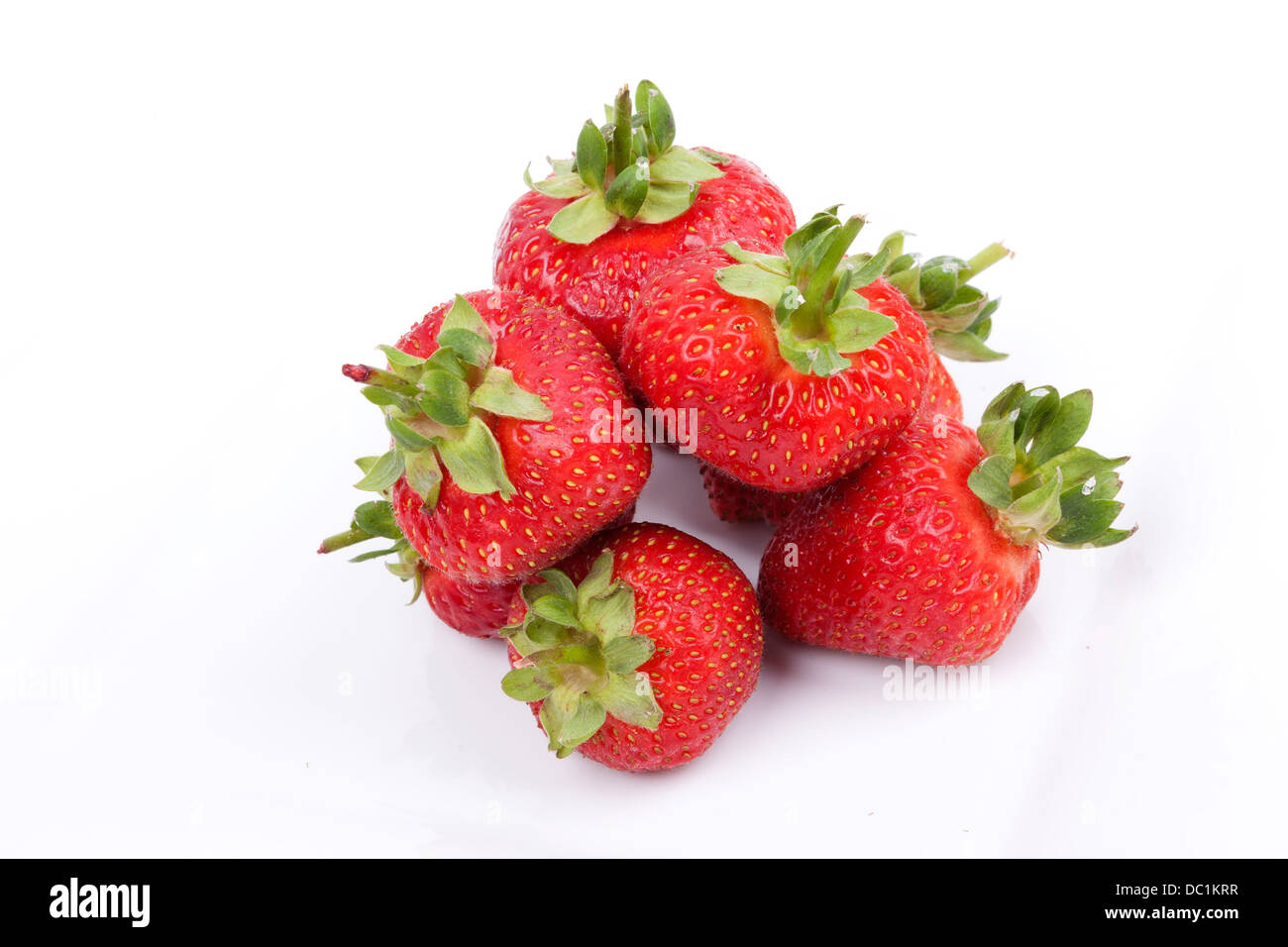 Strawberry fruits isolated on white background Stock Photo - Alamy