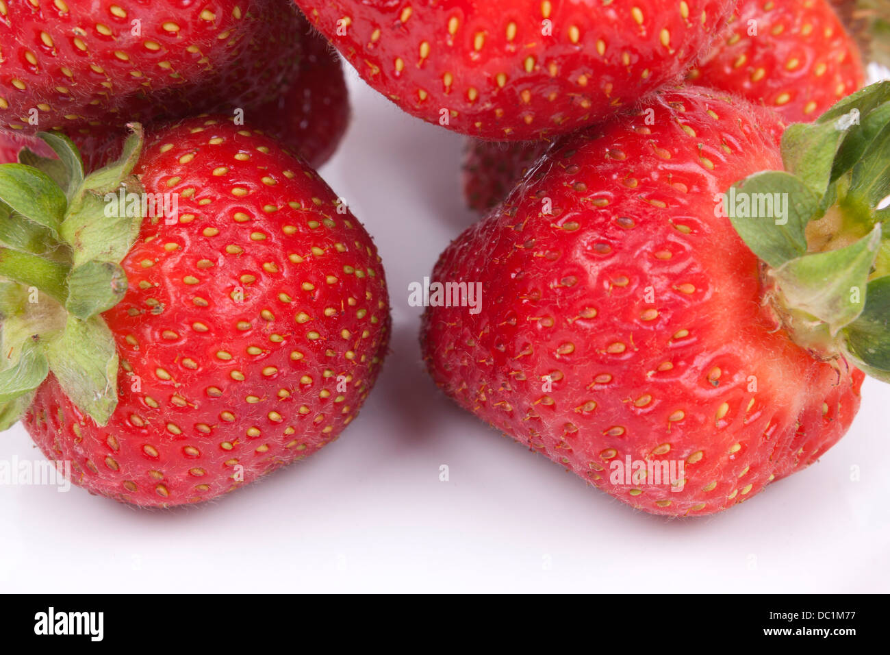 Strawberry fruits isolated on white background Stock Photo Alamy