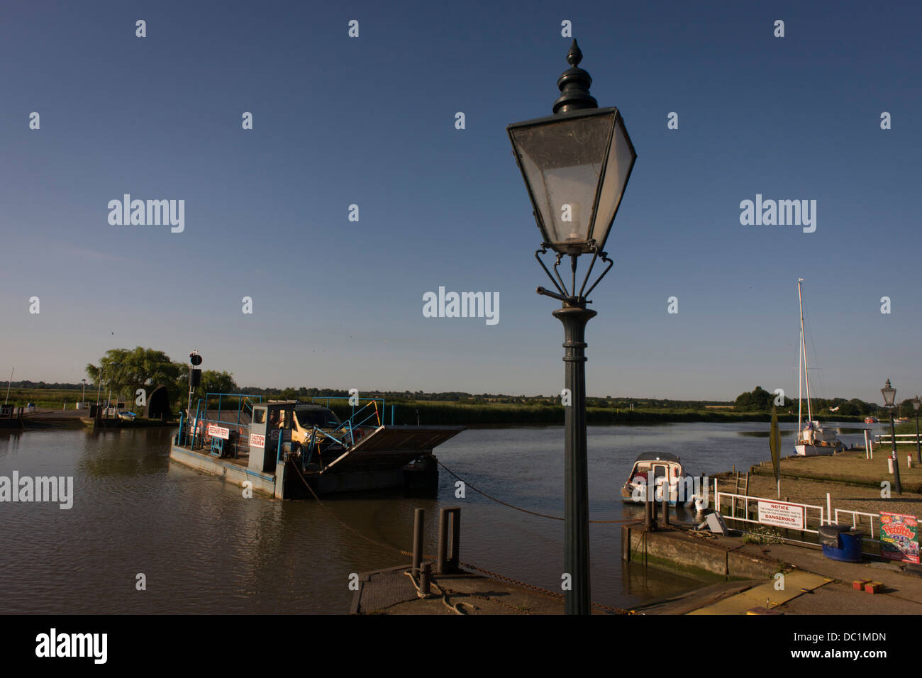 The chain ferry crossing the River Yare in Reedham on the Norfolk Broads. Stock Photo