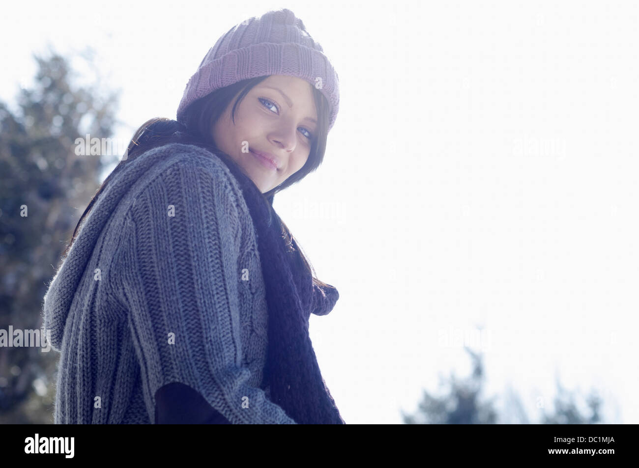 Portrait of young female wearing knitted hat Stock Photo - Alamy