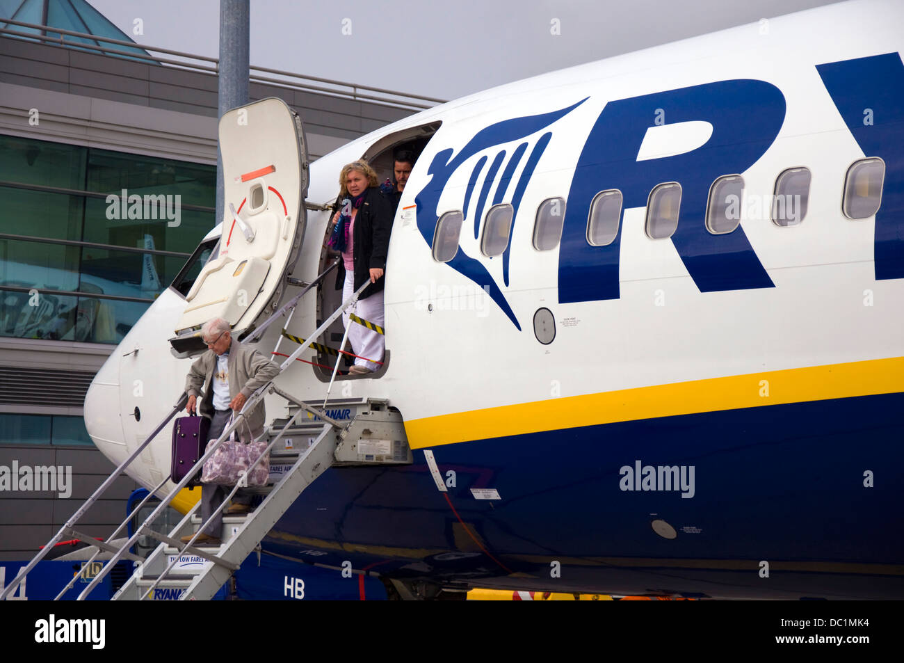 Passengers disembark from a Ryanair flight at Dublin airport terminal one Stock Photo Alamy