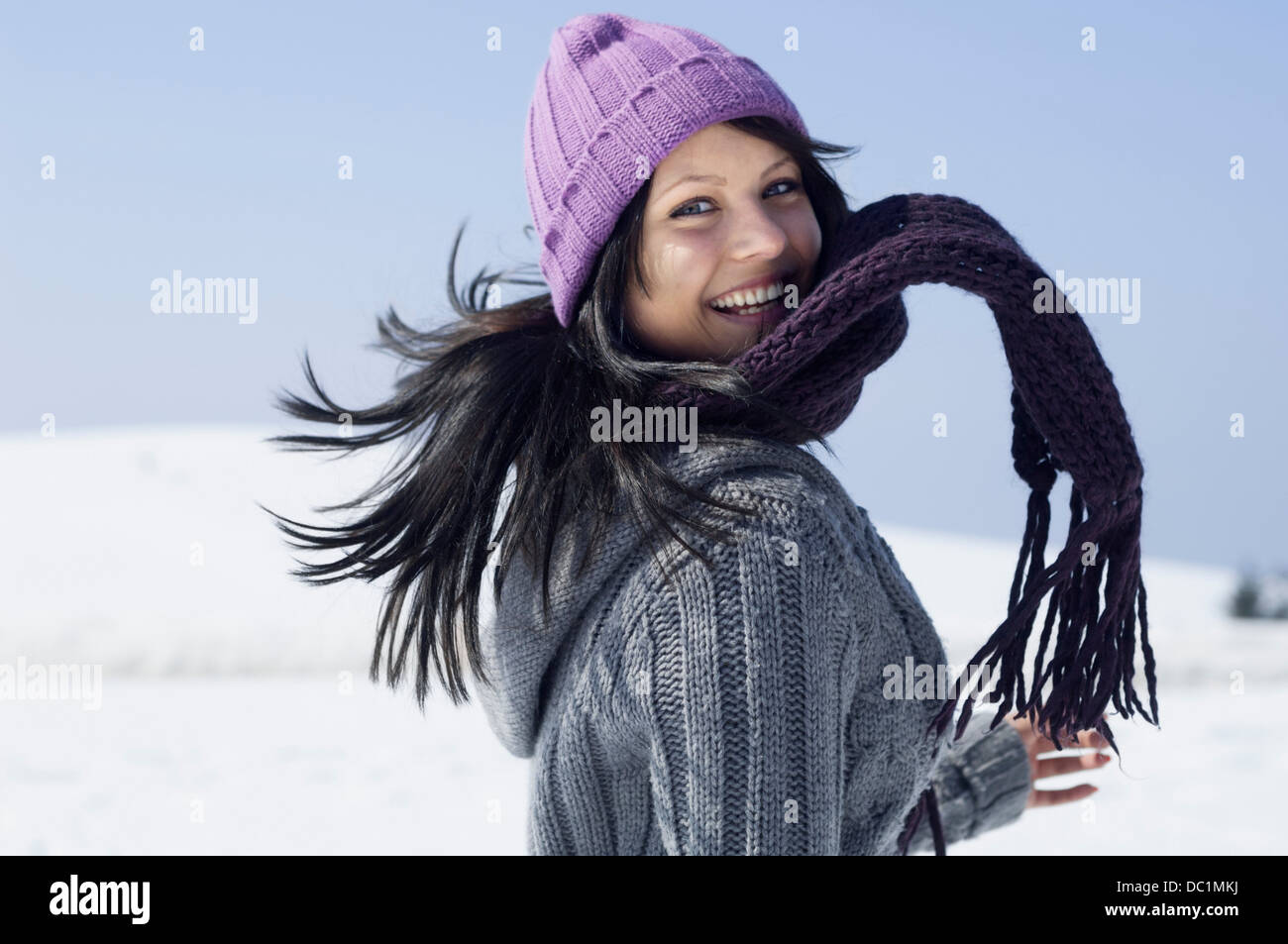 Young female wrapped up and having fun Stock Photo