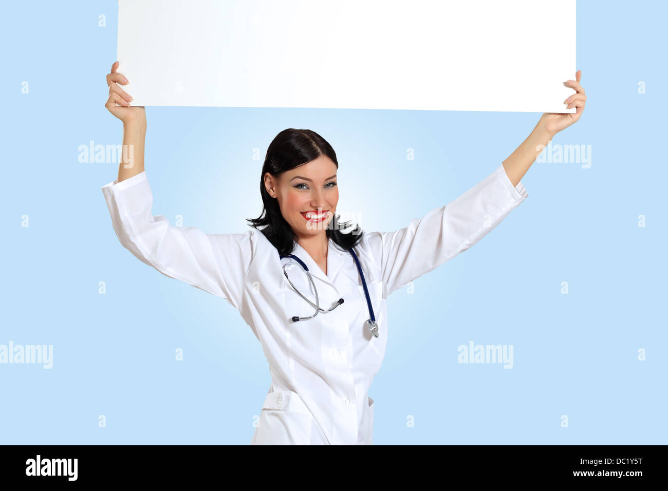 Young female doctor with a banner Stock Photo - Alamy