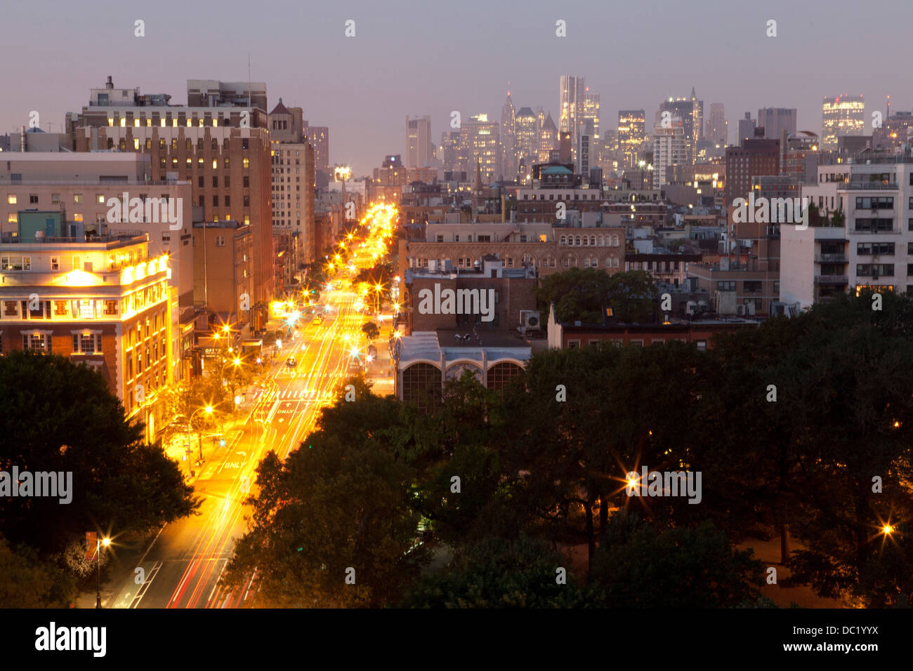 Traffic illuminated in rush hour in New York, USA Stock Photo