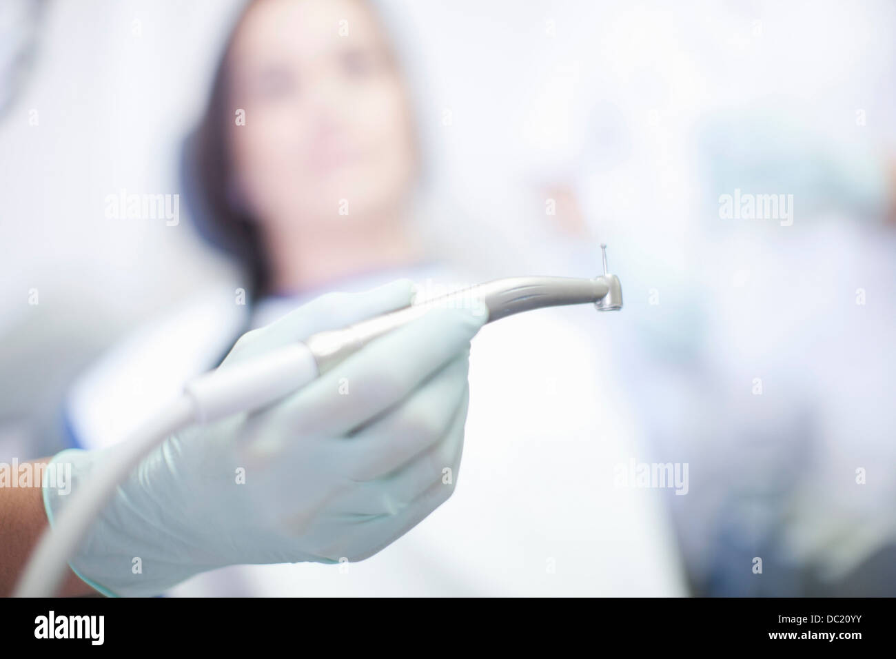 Close up of hand holding dentist drill Stock Photo Alamy