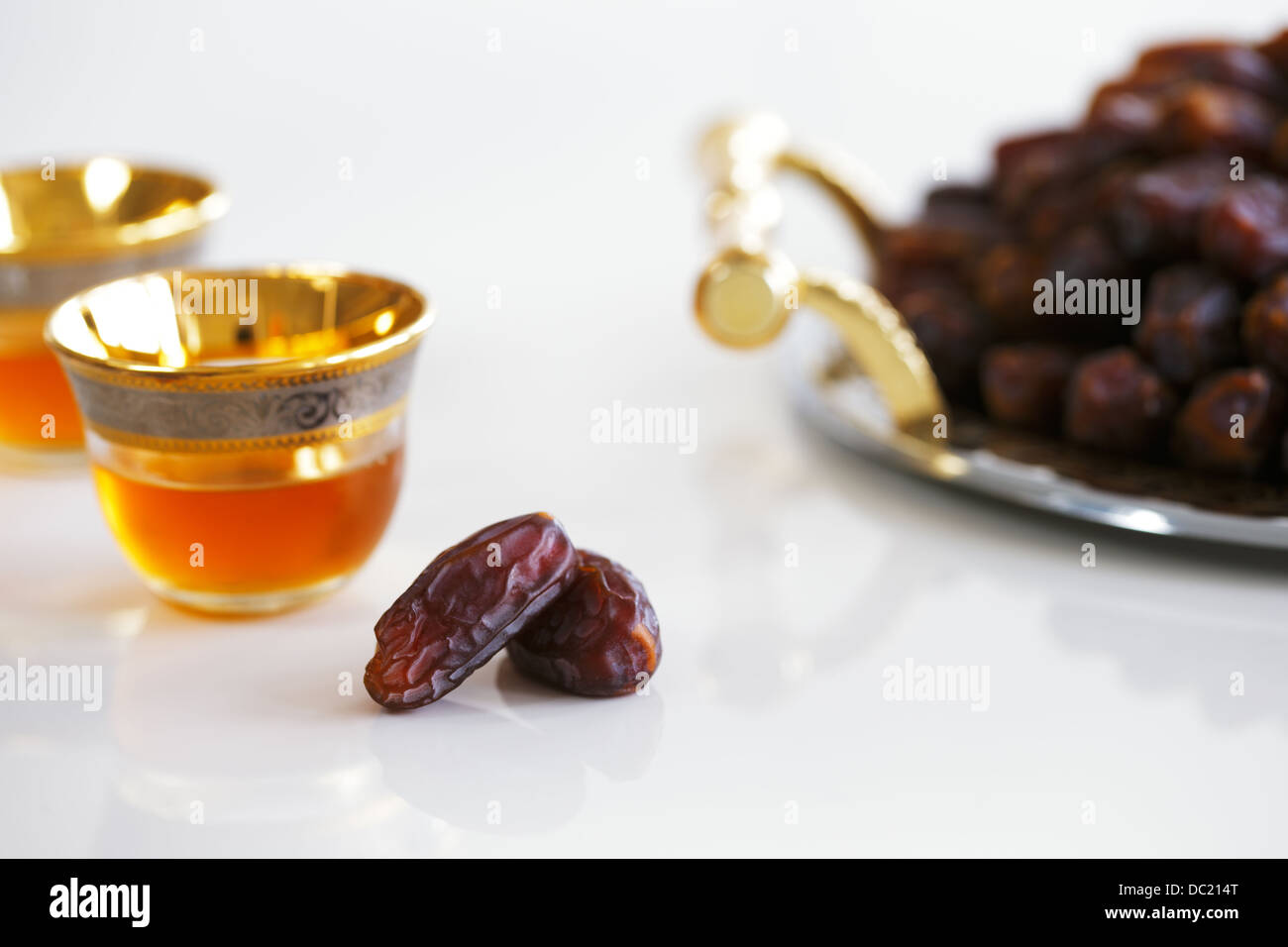 Dried dates and Arabic tea are a prominent feature a typical welcome be expected in Arabia Stock Photo