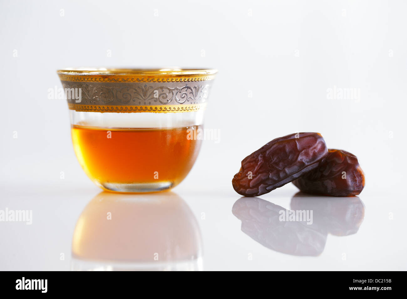 Dried dates and Arabic tea are a prominent feature a typical welcome be expected in Arabia Stock Photo