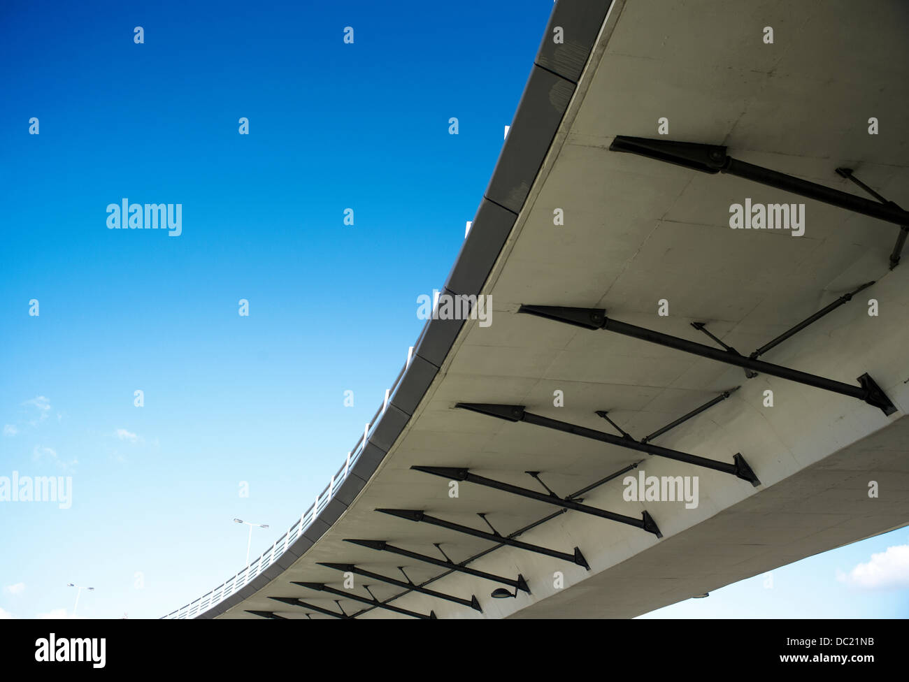 Bridge against blue sky, low angle view Stock Photo