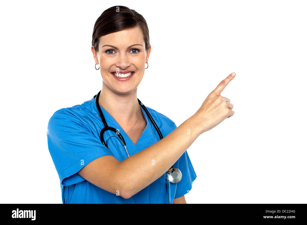 Doctor pointing away with her index finger Stock Photo - Alamy