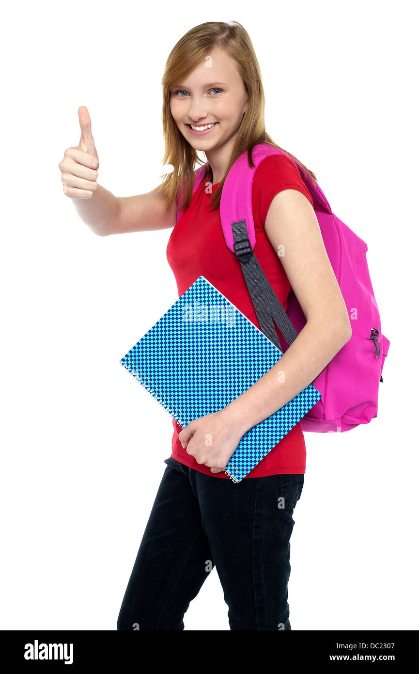 Pretty university student showing thumbs up sign Stock Photo - Alamy