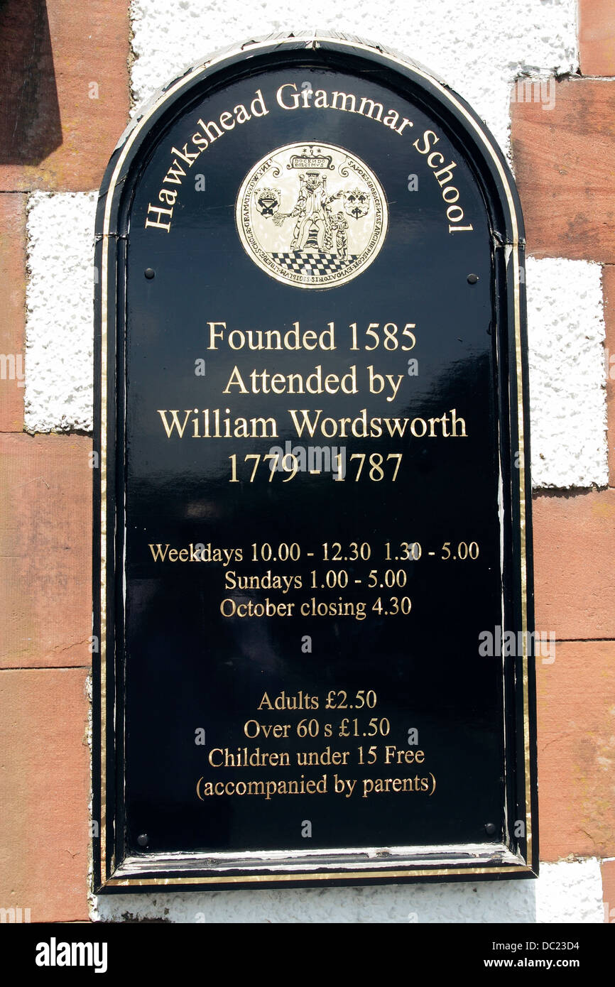 A plaque on the wall of Hawkshead Grammar School attesting to the fact that William Wordsworth went to school here. Stock Photo