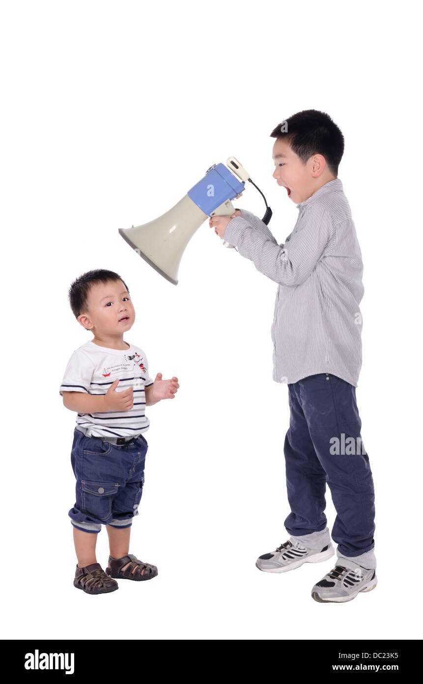 Child yell at megaphone Stock Photo