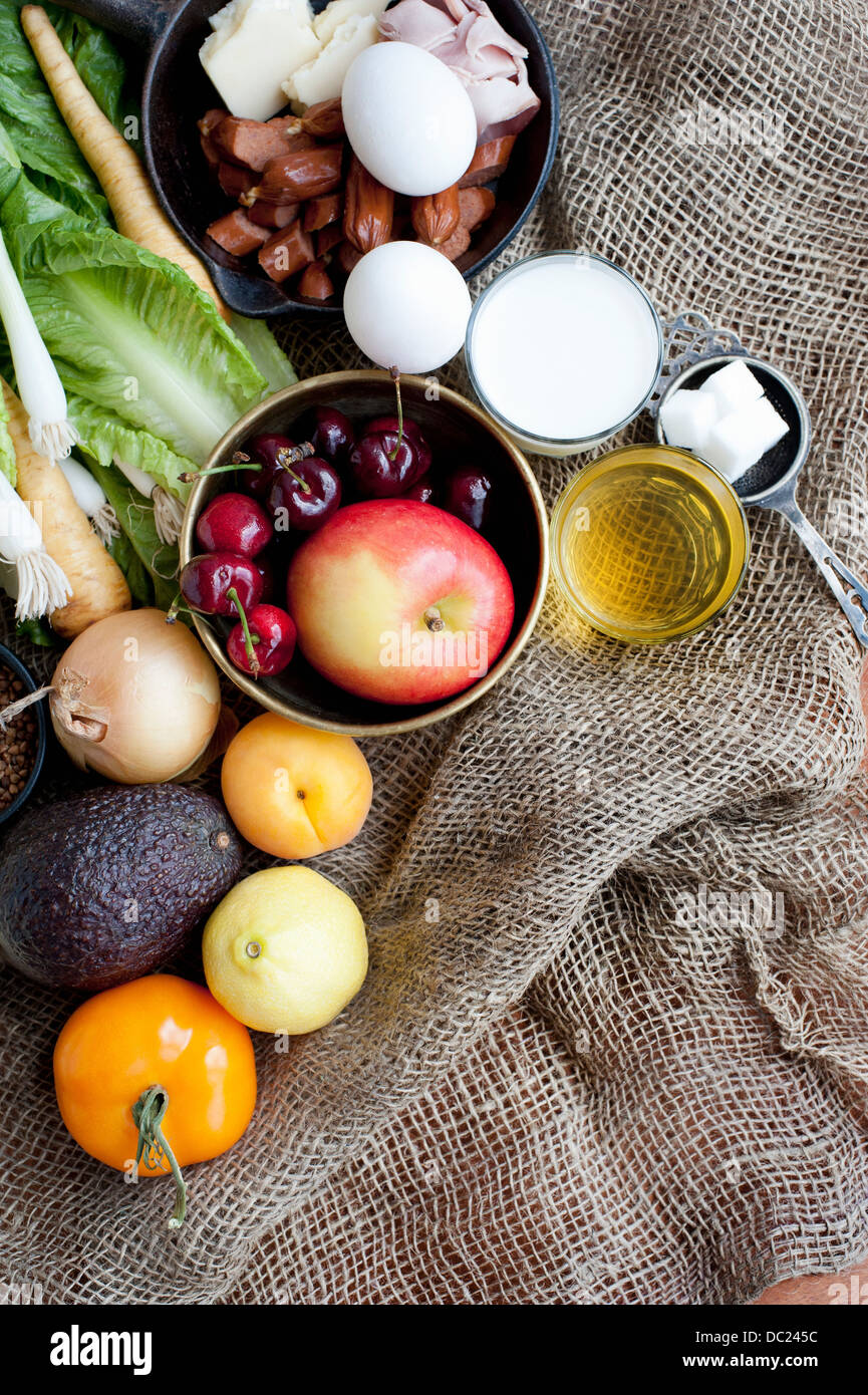 Variety of fresh foods on hessian Stock Photo