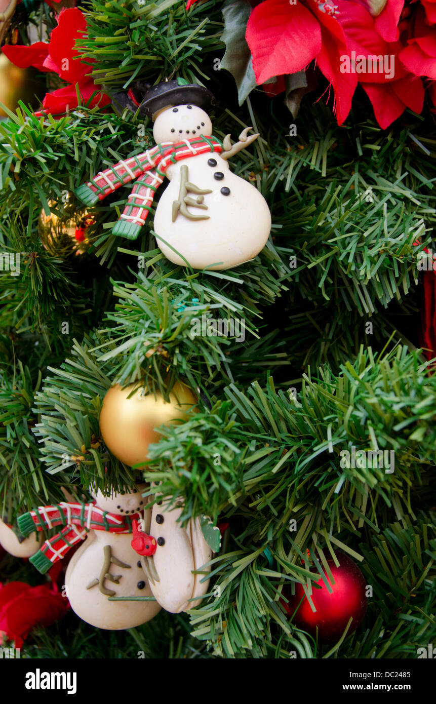 Christmas tree with decorations and surgical mask. Covid 19 pandemic.  Geneva. Switzerland Stock Photo - Alamy