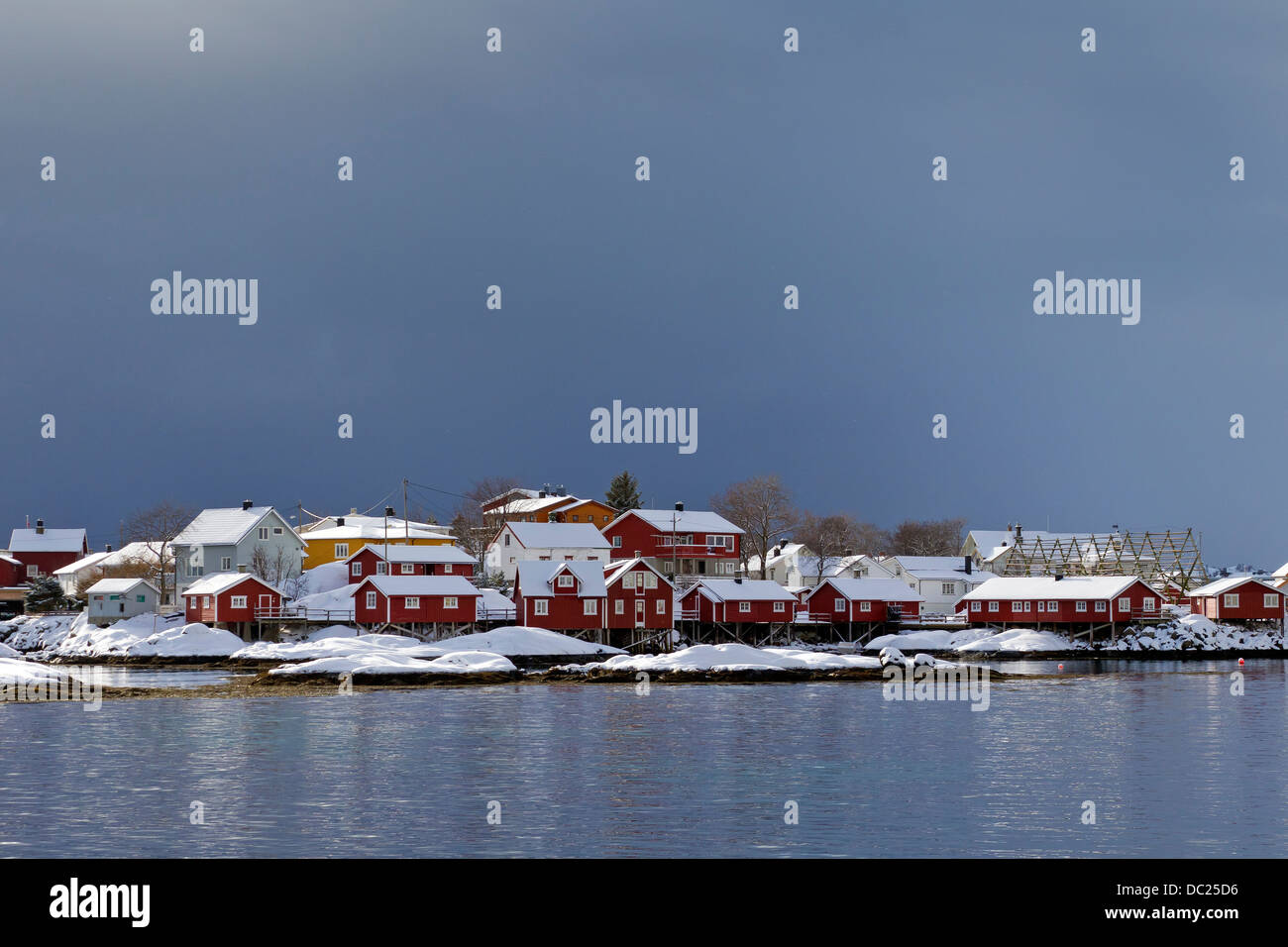Rorbuer cottages in harbour at Svolvaer / Svolvær in snow in winter, Austvågøy / Austvågøya Vågan, Lofoten, Norway, Scandinavia Stock Photo