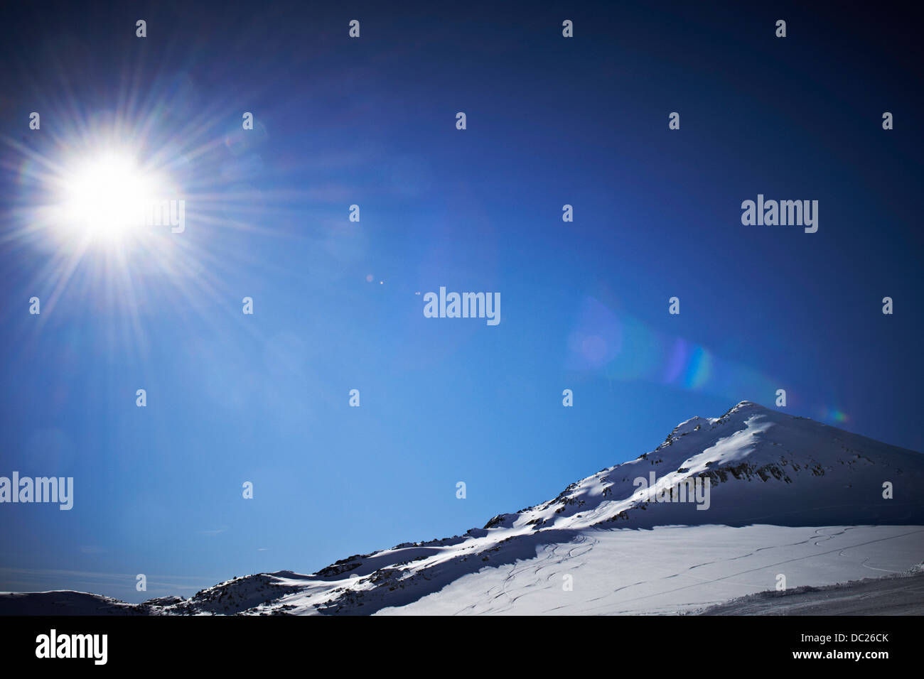 Sunlit, snowcapped mountain in Austria Stock Photo