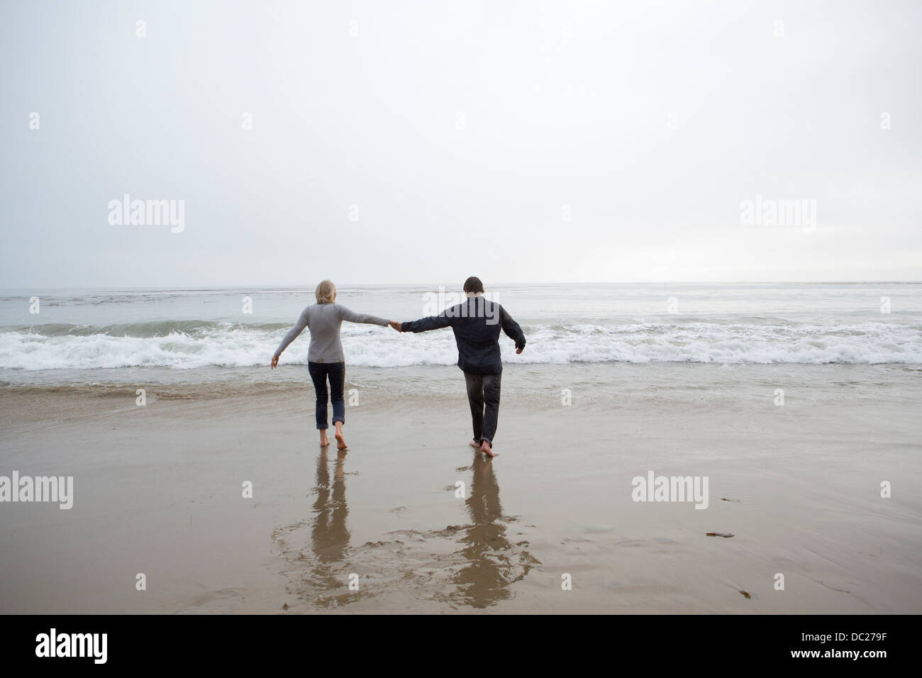 Mature couple holding hands hi-res stock photography and images - Alamy