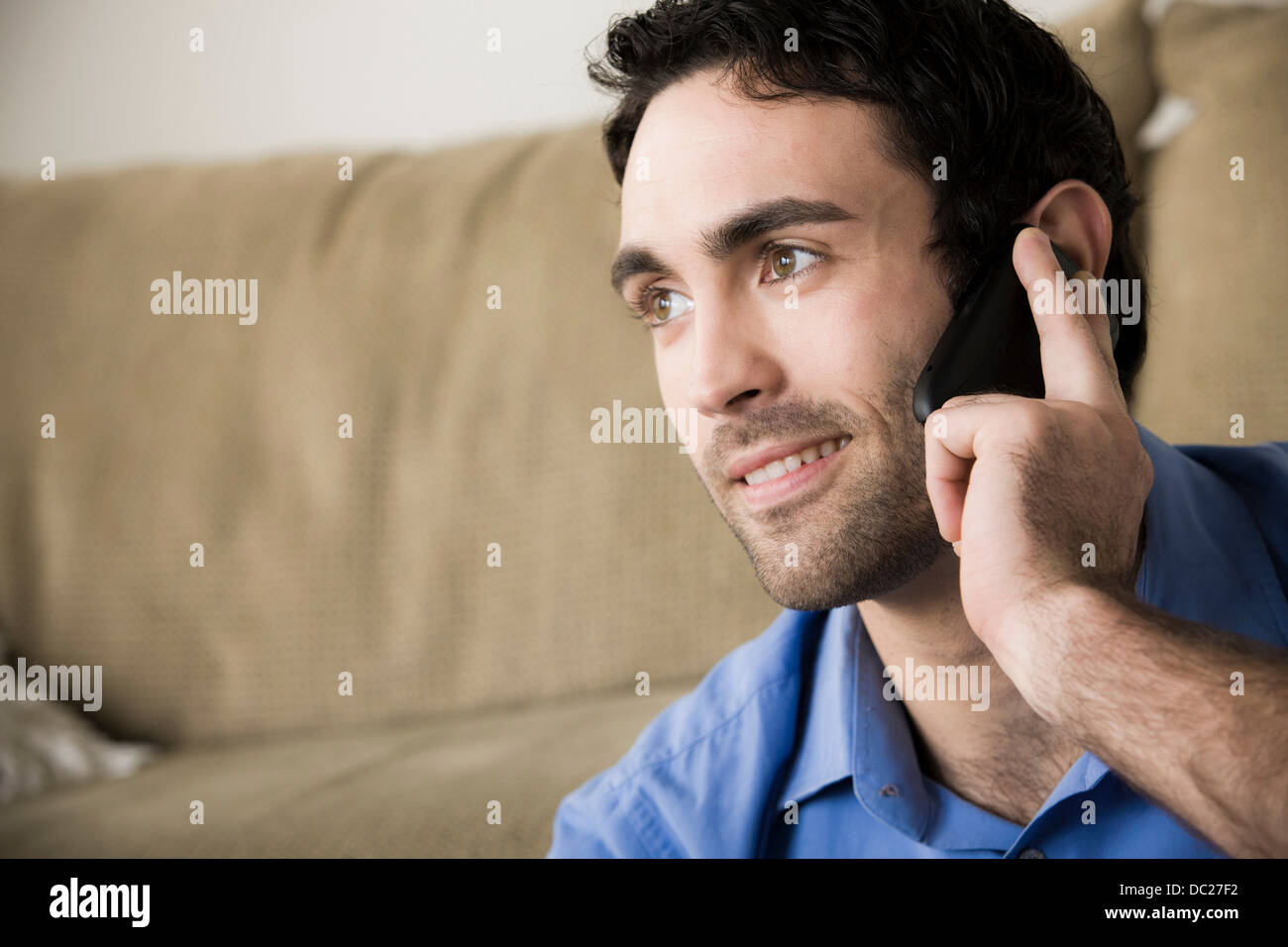 Young man on cell phone Stock Photo