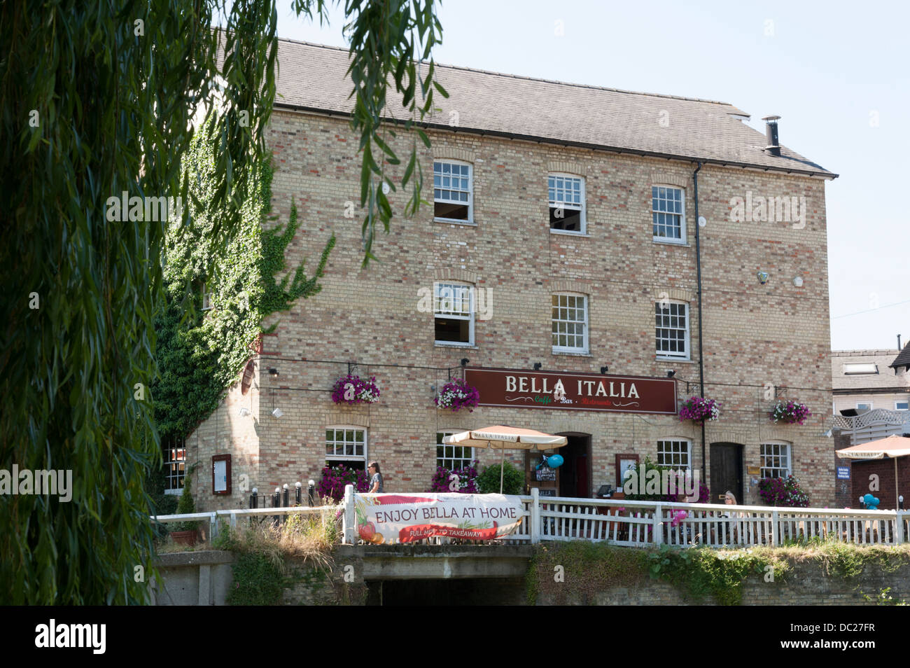 The Bella Italia Restaurant in a converted mill at Cambridge UK in summer. Stock Photo