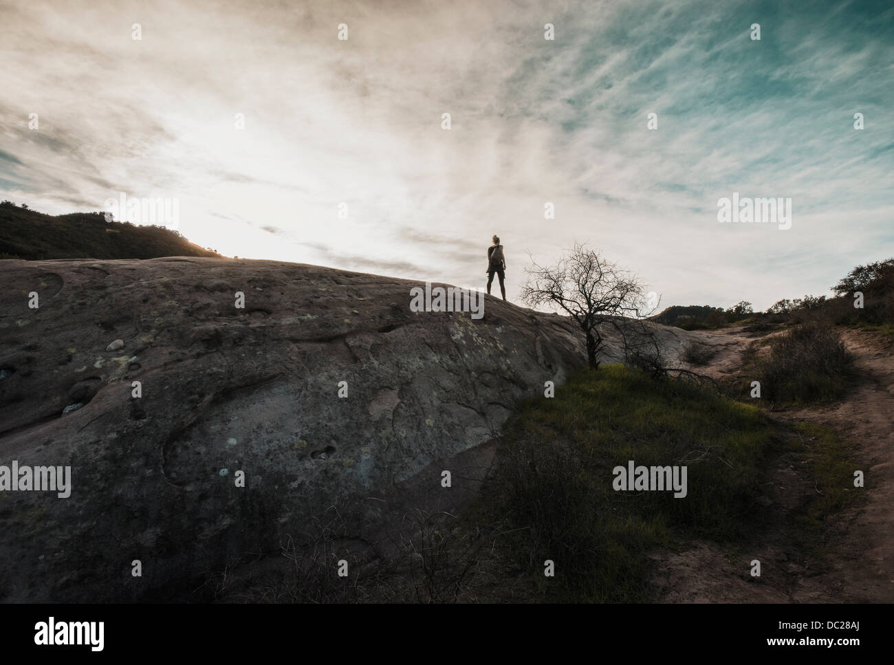 Silhouette of woman on mountain hi-res stock photography and images - Alamy