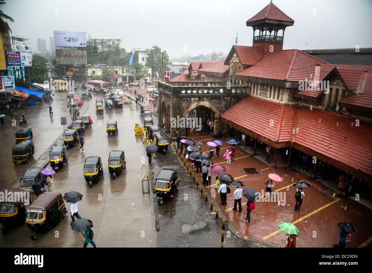 Bandra Station in Mumbai wet weather terminus rickshaw Stock Photo