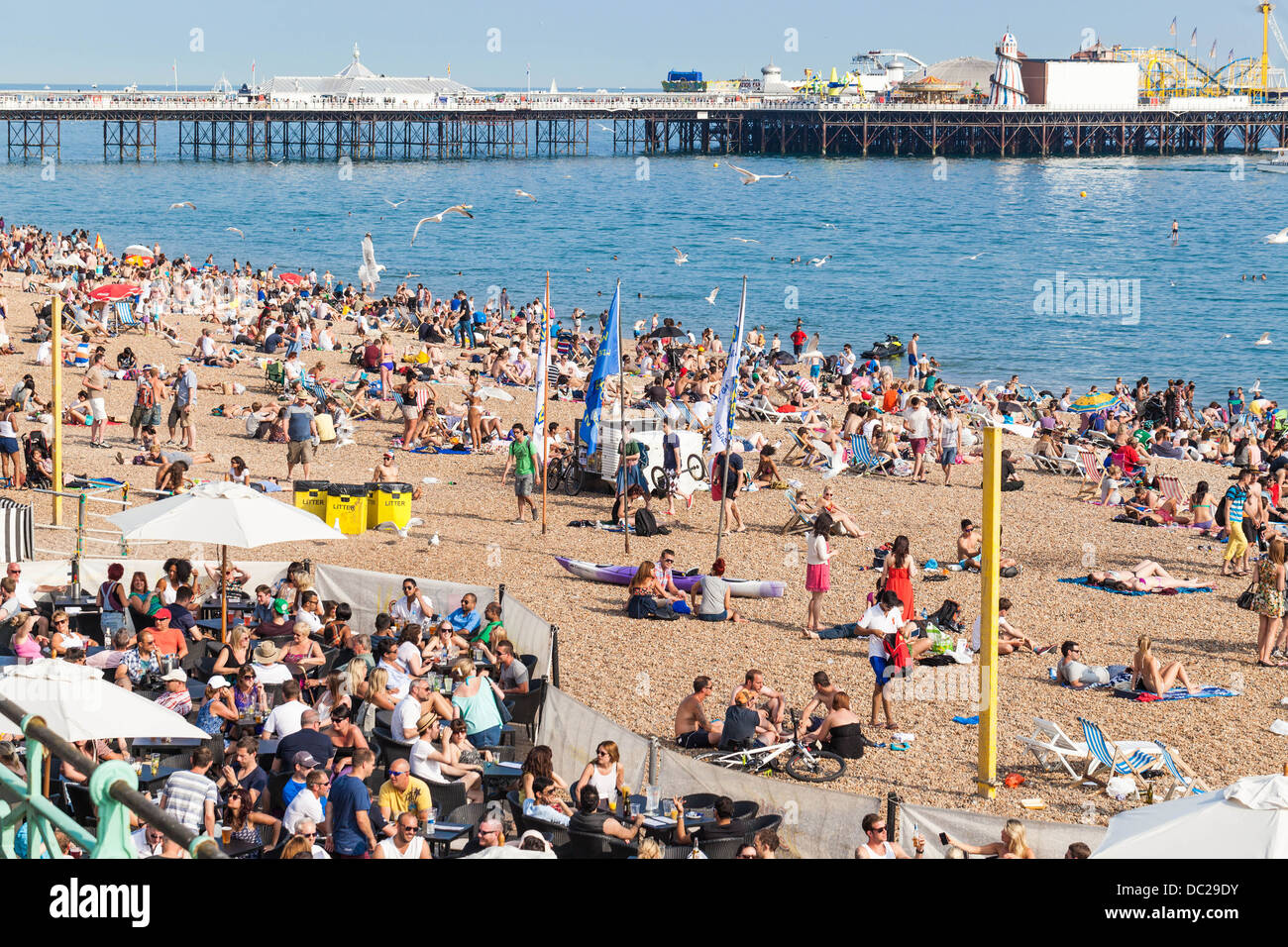 Busy beach, Brighton, England, UK Stock Photo
