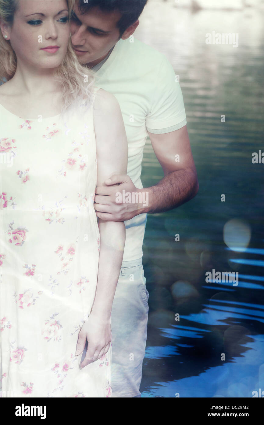 a couple in water, hugging Stock Photo