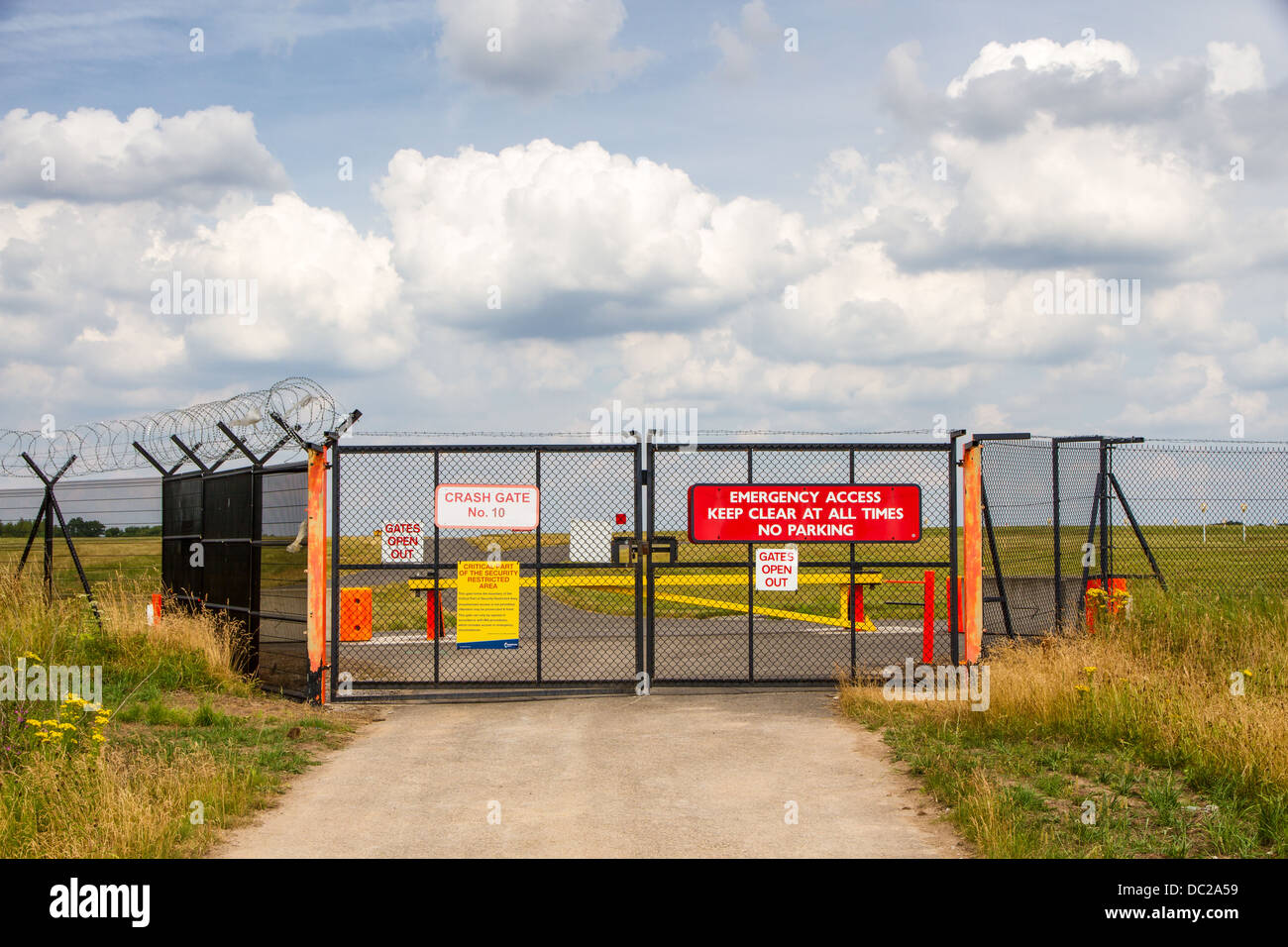 Emergency crash gates at Manchester Airport Stock Photo