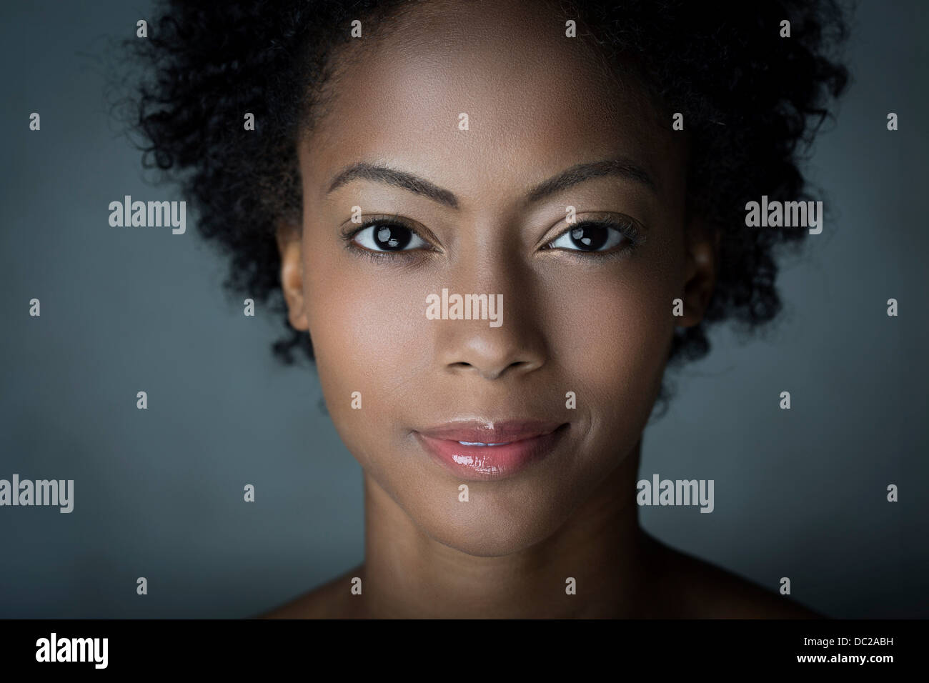Portrait of woman with afro hair Stock Photo