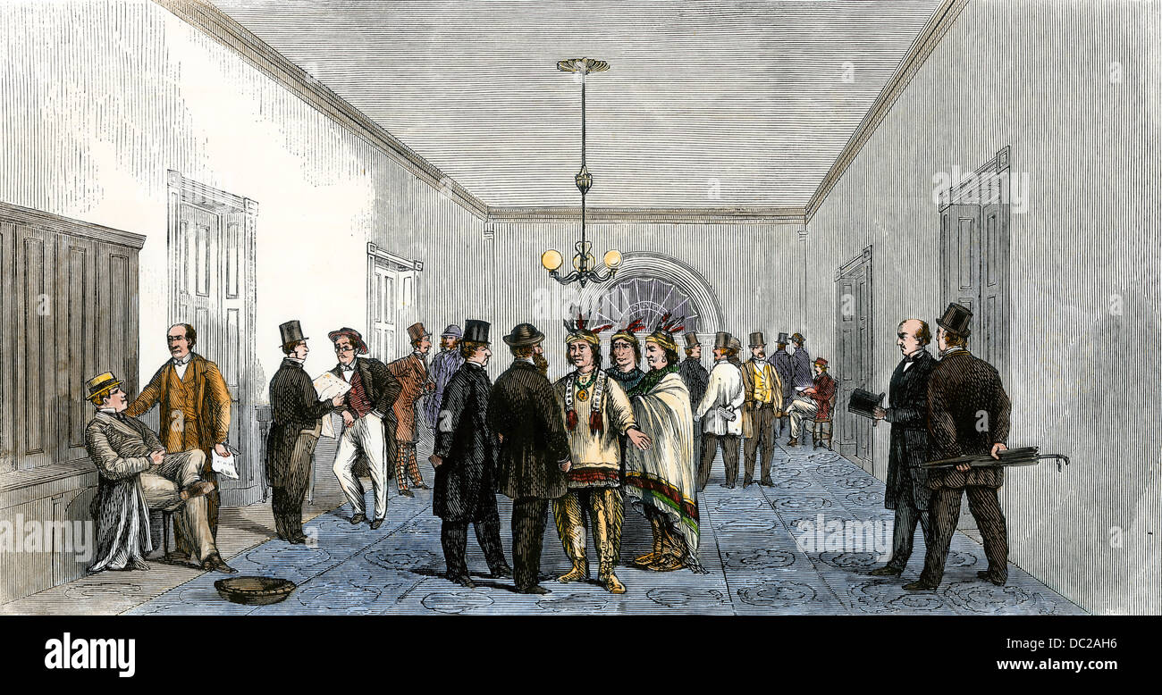 Native American chiefs visiting President Grant in the White House, 1871. Hand-colored woodcut Stock Photo