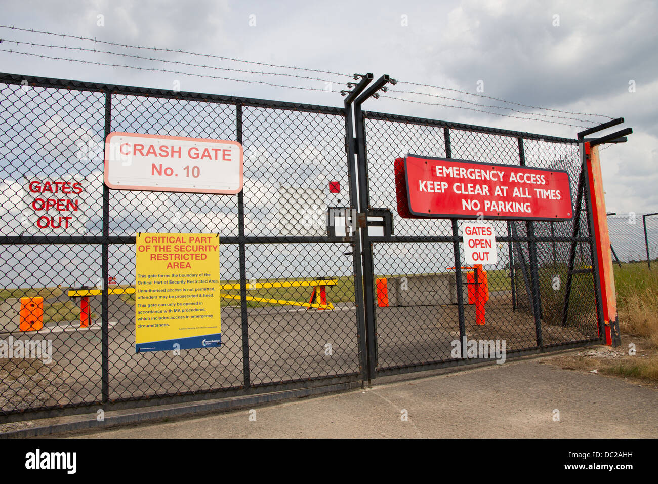 Emergency crash gates at Manchester Airport Stock Photo