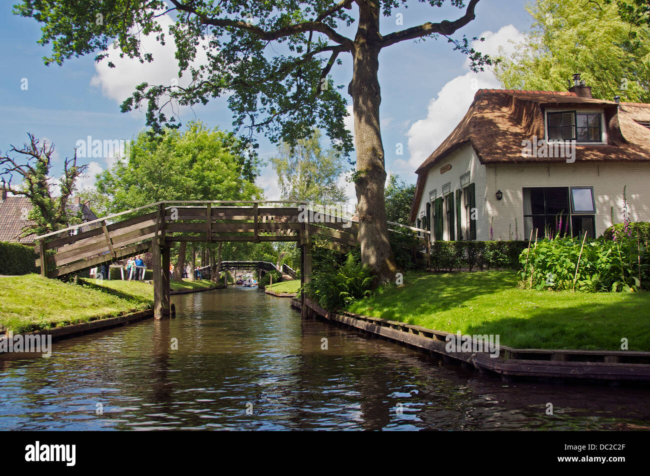 Canal and humpback footbridges Giethoorn Holland Stock Photo
