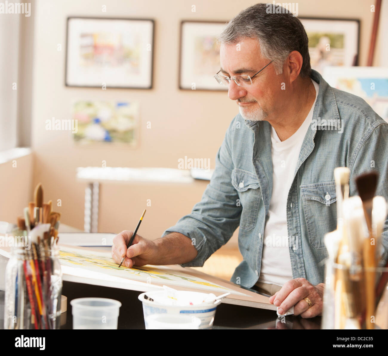 Man painting with watercolors Stock Photo