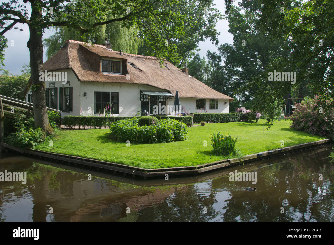 Pretty waterside house and canal Giethoorn Holland Stock Photo