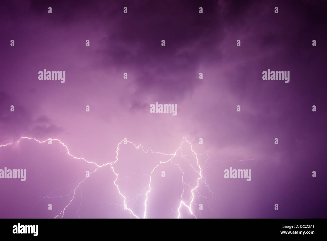 A wide shot of a lightning strike during a night storm Stock Photo - Alamy