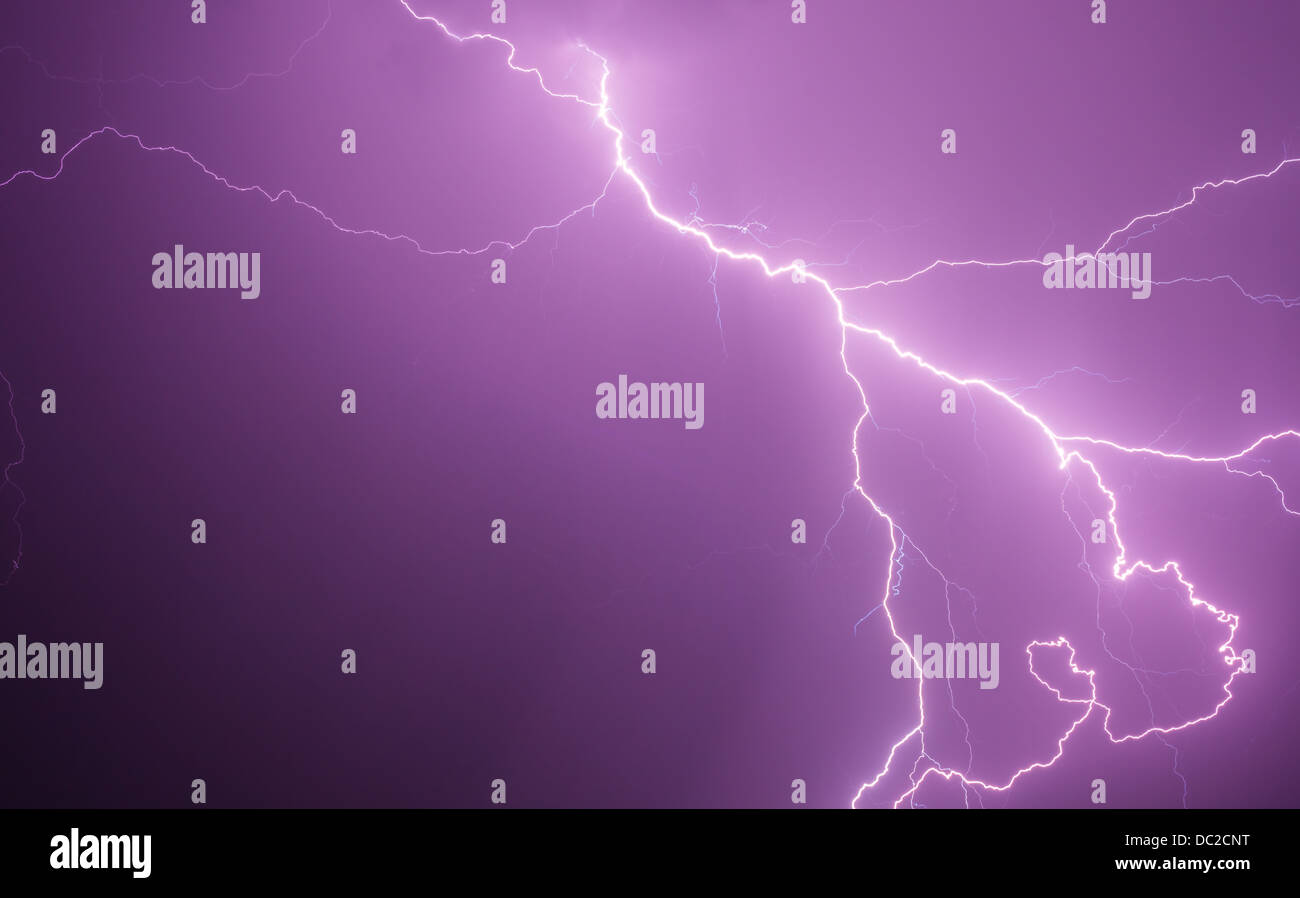 A wide shot of a lightning strike during a night storm Stock Photo - Alamy