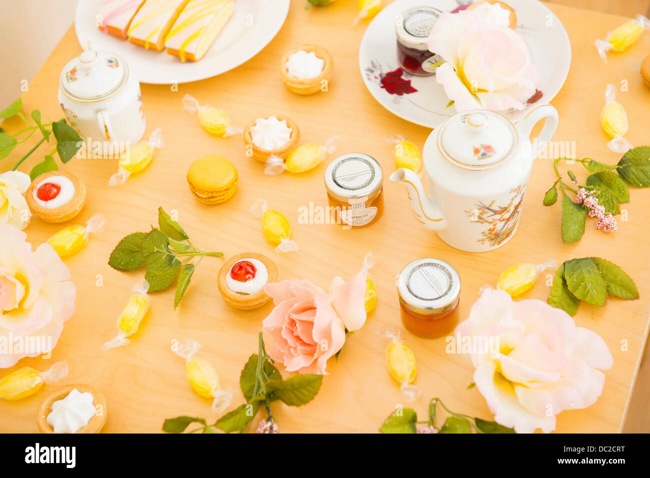 Table with assortment of cakes and confectionery Stock Photo