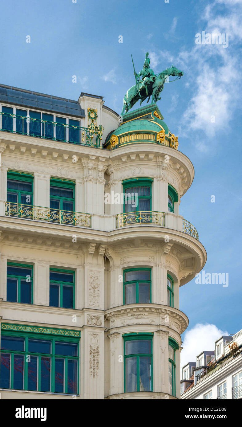 Edge of a building, with a statue of a hussar at top, 'Am Graben' 18, Vienna, Austria. Stock Photo