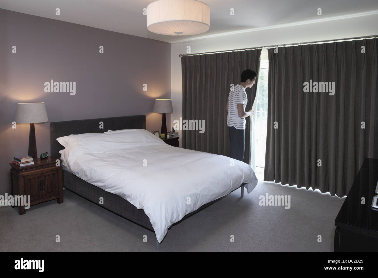 Man peeping bedroom hi-res stock photography and images - Alamy