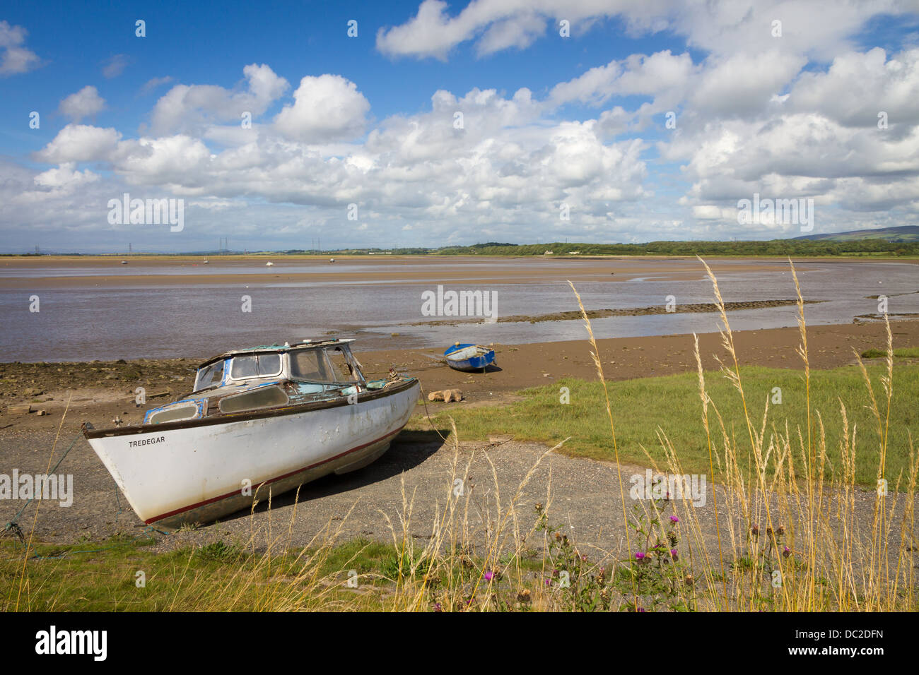 The River Lune at Glasson Dock during low tide with boat. City of Lancaster District. Lancashire. Stock Photo