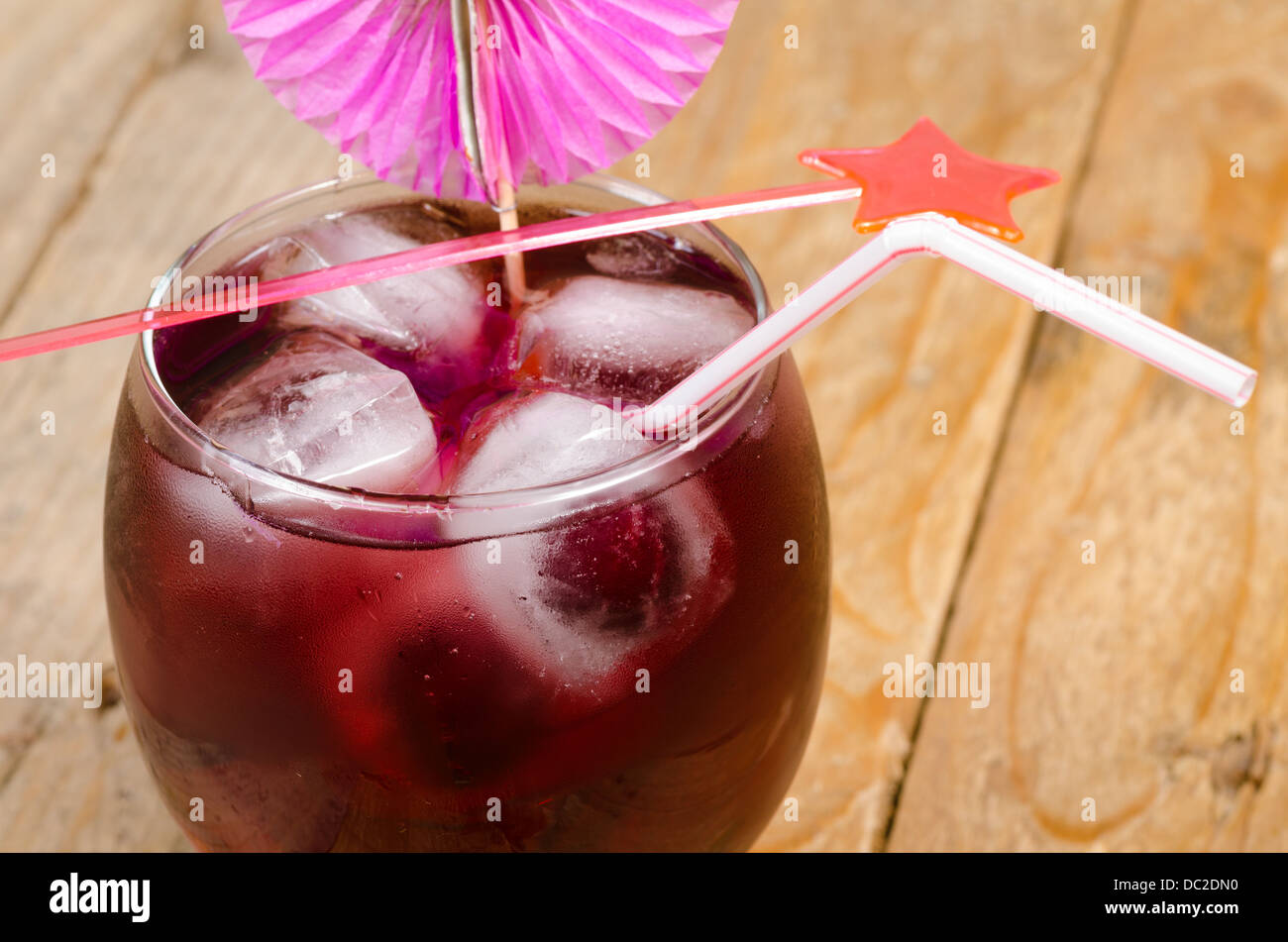 Deep red cocktail in a glass with plenty of ice Stock Photo