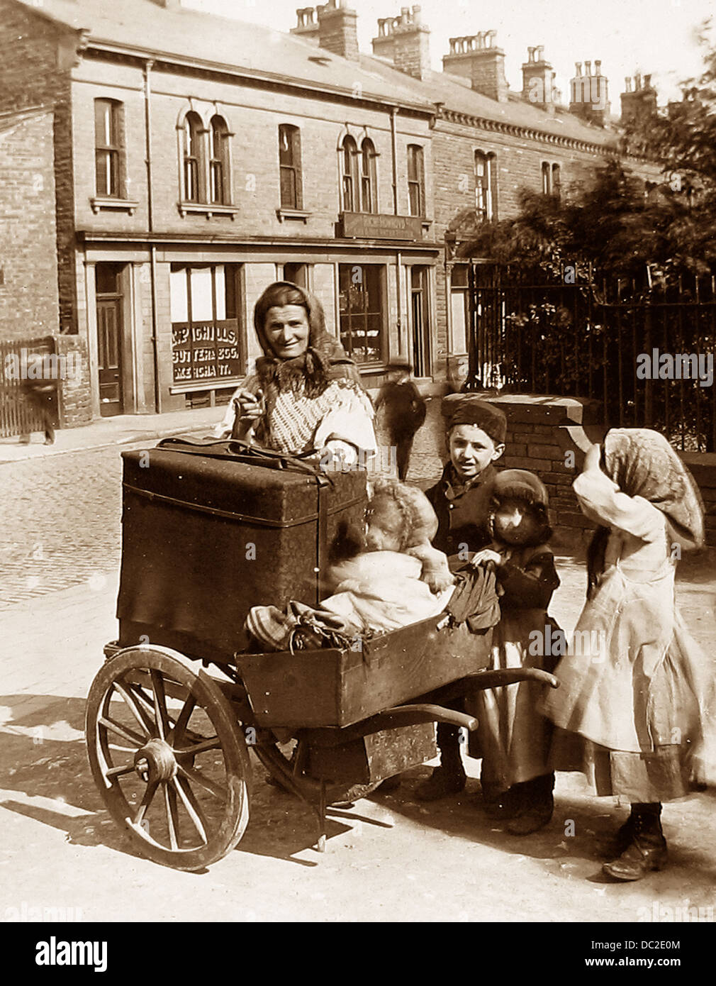 Poor family doing a flit / moving home, Victorian period Stock Photo