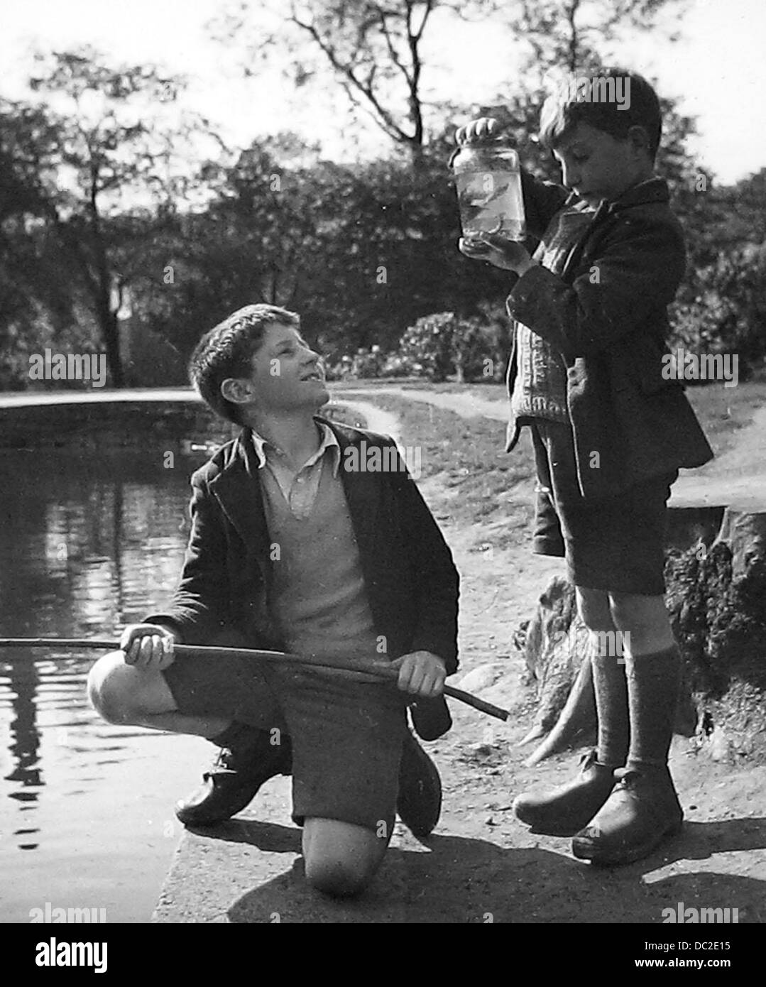 Boys fishing 1950's hi-res stock photography and images - Alamy